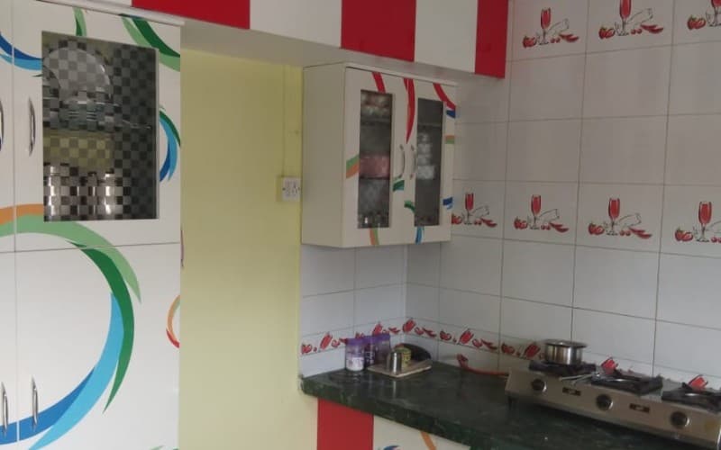 Contemporary Red-Accent Kitchen - Modular Kitchen by Geet Enterprises Nashik